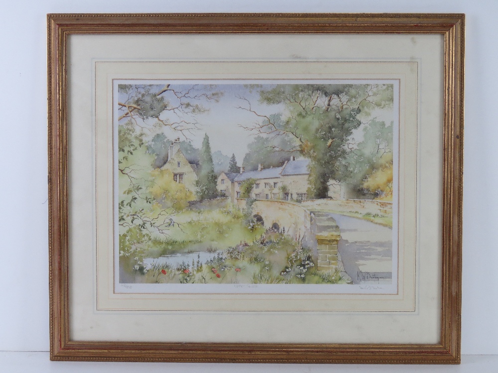 A signed limited edition print of Upper Swell having stone bridge over river leading to the village,