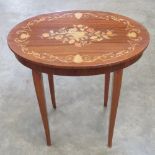 A 20th century inlaid musical occasional table having lid lifting to reveal compartment within,