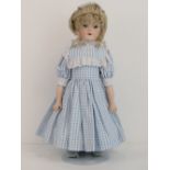 A handmade 20th century bisque headed doll made using an antique doll mould,