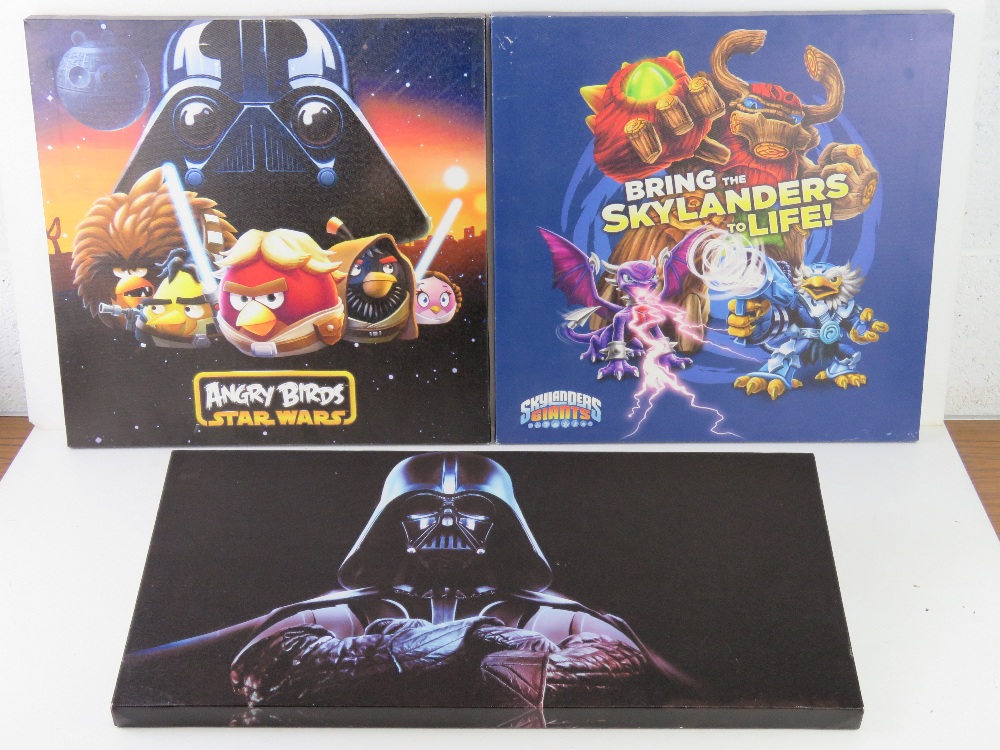 Three canvas prints inc Star Wars Angry Birds.