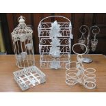 A quantity of decorative metal items including bird cage, napking holder, 3 tier shelf unit.
