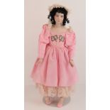 A handmade 20th century bisque headed doll made using an antique doll mould,