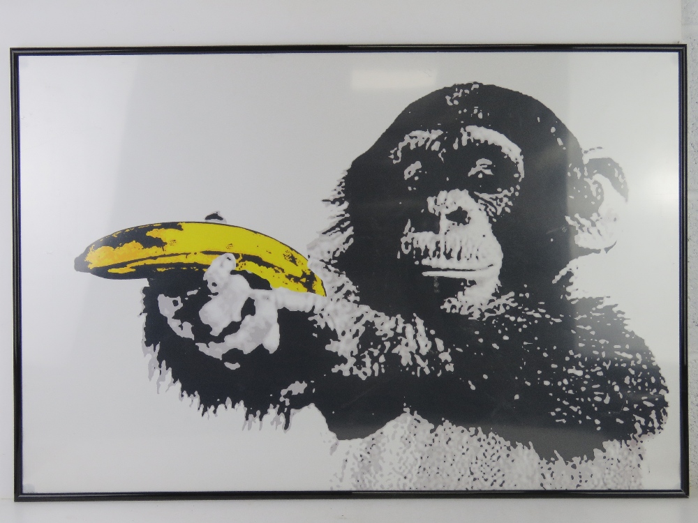 Two contemporary poster prints in frames being a chimp with banana and French cafe, - Image 3 of 3