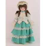 A handmade 20th century bisque headed doll made using an antique doll mould,