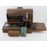 A Singer sewing machine with original lid and key, Y7652147.