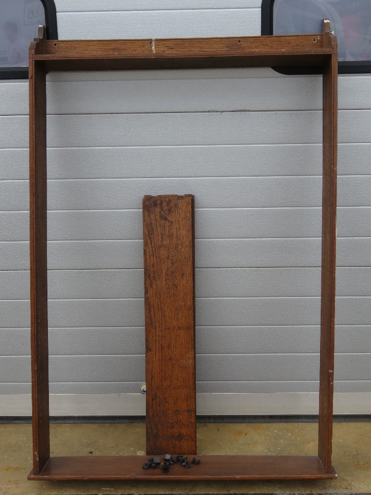 A late Victorian set oak hanging shelves having four adjustable shelves within, 161 x 105cm.