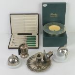 A quantity of silver plated ware including chambersticks, two egg coddlers,