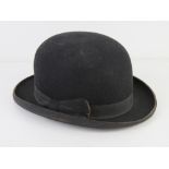 A felt bowler hat as made by Herbert Johnson of London, size 7 1/4.