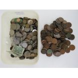 A large quantity of 20thC world coinage together with an HM silver ARP badge.