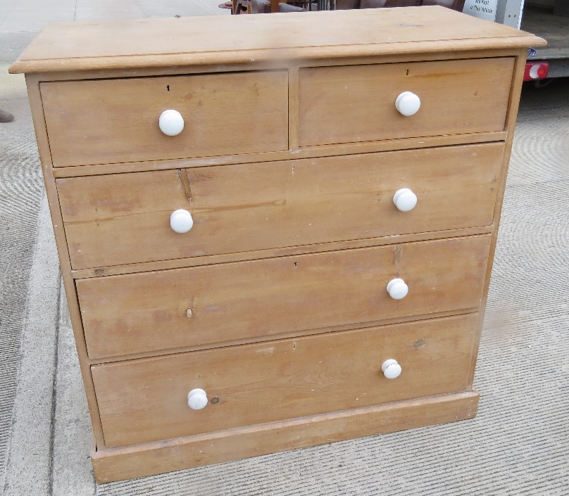 A Victorian pine chest of two over three drawers,