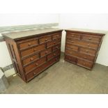 A suite of two matching chests of drawers, one large one small,