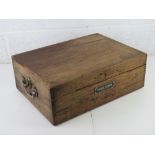 A twin handled pine toolbox bearing label Taylor-Hobson Leicester measuring approx 50 x 36.5 x 17.