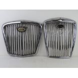 Two vintage Wolseley car grills, chromed, badges a/f, the larger being 43cm at widest, the other 34.