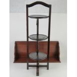 A c1930s folding lazy Susan together with a mahogany bookshelf, 67.5cm wide. Two items.