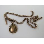 A 9ct hallmarked rose gold Albert chain having enamelled and 375 hallmarked rose gold medallion and