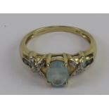 A 9ct gold aquamarine and diamond ring,