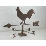 A weather vane having cockerel upon, arrow measuring 55cm in length, standing approx 42cm high.