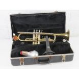 A vintage trumpet having silvered mouthpiece, a/f, in case marked The Selmer Company.