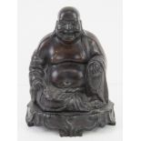 A heavy bronzed Buddha figurine approx 19cm high.