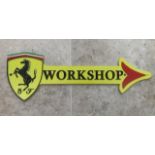 A contemporary Ferrari-themed 'Workshop' arrow sign in the colours of the City of Modena. 44cm dia.