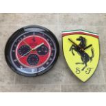 Two Ferrari-themed contemporary small wall clocks, both having Quartz movements,