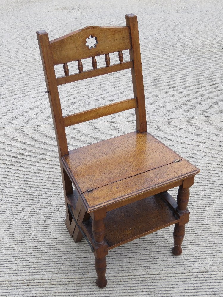 A single oak metamorphic set of library steps folding to form a chair. Height of seat is 44cm. - Image 2 of 3