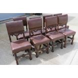 Eight (4+2+1+1) oak framed leather seated dining chairs.