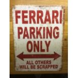A small novelty aluminium 'Ferrari Parking Only' wall sign, 'aged' and having corner fixing holes,