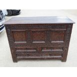 A fine 18th century or earlier inlaid oak mule or marriage chest,