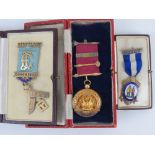 Three HM silver Masonic medals each in fitted case;