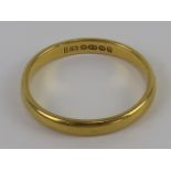 A 22ct gold band hallmarked for Birmingham, size L, 2.5g.