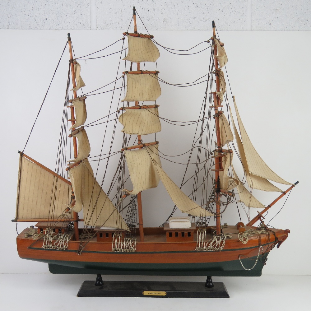 A model ship 'Constitution' having three masts with rigging and sales upon, slight a/f,