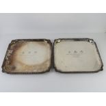 A matched pair of silver plated square shaped presentation salvers each inscribed 299 (R.B.Y., Q.O.