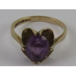 A 9ct gold amethyst ring, hallmarked 375, stone approx 8 x 6.5 x 4.3mm, size I-J, 1.9g.