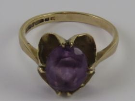 A 9ct gold amethyst ring, hallmarked 375, stone approx 8 x 6.5 x 4.3mm, size I-J, 1.9g.