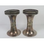 A pair of silver plated bud vases having Regency style fret work rim.