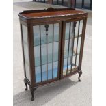 An Edwardian glazed walnut display cabinet, 90 x 31 x 120cm.