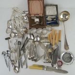 A quantity of assorted silver plated cutlery, napkin rings, christening sets, punch ladle etc.