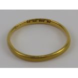 A 22ct gold band, size P, 1.7g.