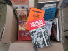 Fifty assorted military themed books inc