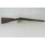 A deactivated Mortimer 12 bore shotgun.