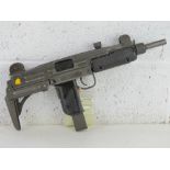 A deactivated Uzi 9mm Sub Machine Gun. L