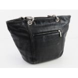 A black leather handbag made in France by Texier approx 19cm wide. Pen marks noted to lining.