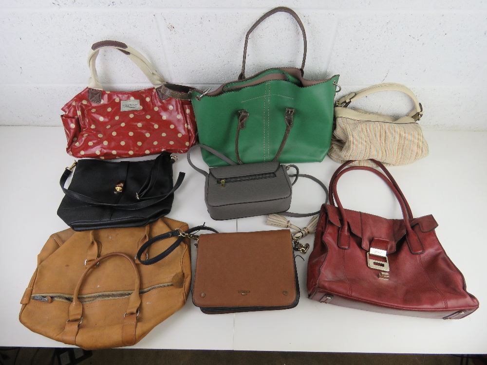 A quantity of assorted handbags inc red polka dot, green tote, vintage leather, fabric tote,