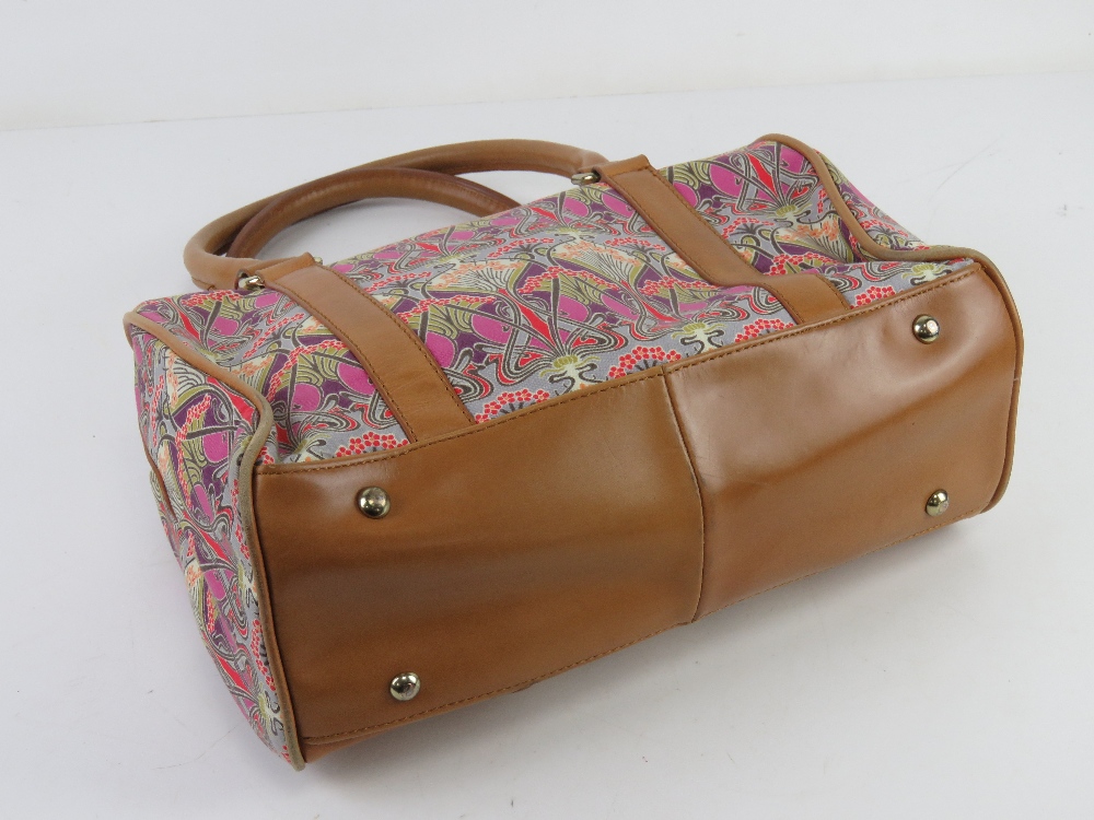 A Liberty pattern fabric and leather handbag by Clarks with original dust bag, approx 32cm wide. - Image 2 of 4