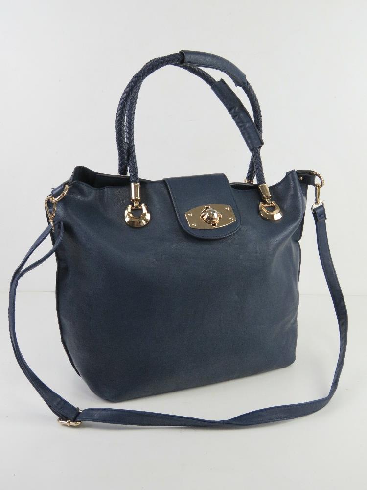 A navy blue tote bag with shoulder strap and woven handles, approx 30cm wide.