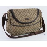 A vintage canvas bag marked for Gucci having studs further marked for Gucci, unauthenticated,
