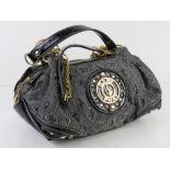 A Baby Phat handbag approx 28cm wide.