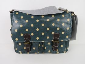 A green polka dot satchel type handbag 'as new', approx 35 x 26cm.