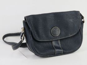 A vintage blue leather Shilton International cross body handbag, approx 23cm wide.